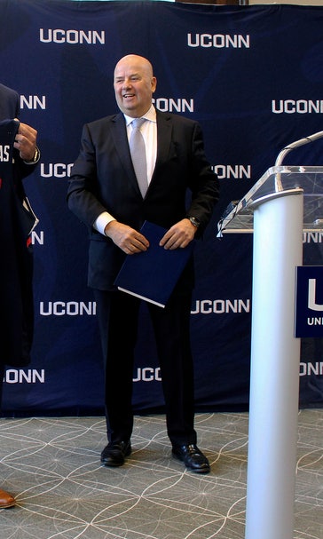 New UConn president says he’s committed to football